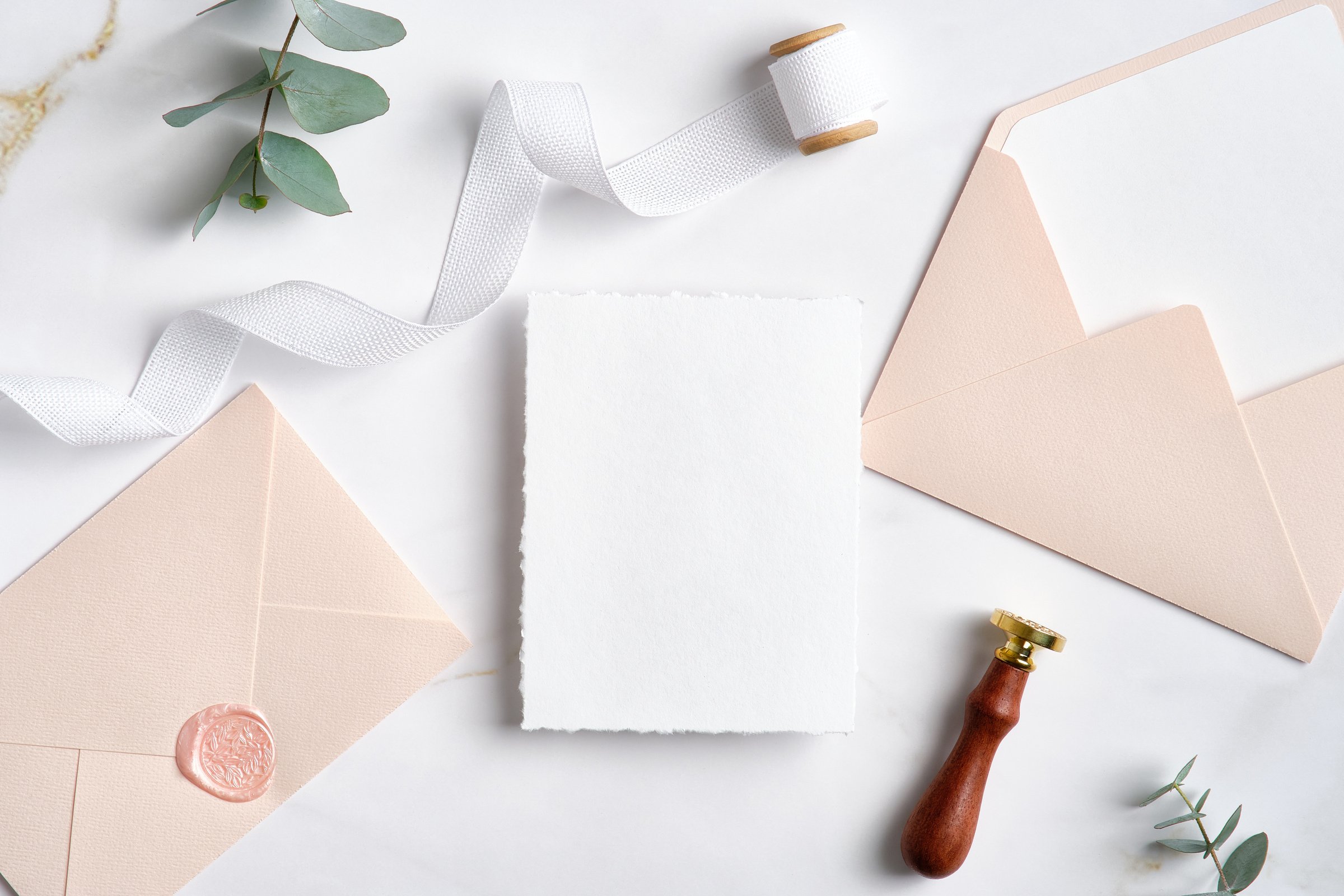 Elegant Wedding Invitation Card Template and Pastel Pink Envelopes on Marble Table. Aesthetic Wedding Stationery Set.